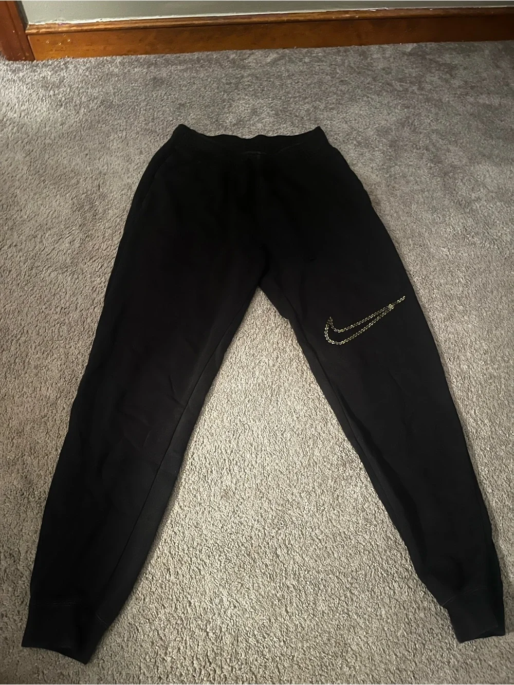 Nike Black Jogger Sweatpants with Gold Swoosh